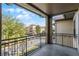 Private balcony overlooking a residential street at 902 Charo Pkwy # 636, Davenport, FL 33897