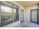 Balcony with door access and window at 902 Charo Pkwy # 636, Davenport, FL 33897