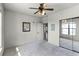 Spacious bedroom with mirrored closet and access to bathroom at 902 Charo Pkwy # 636, Davenport, FL 33897