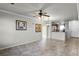 Open floor plan living room, kitchen, and dining area at 902 Charo Pkwy # 636, Davenport, FL 33897