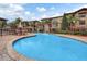 Inviting pool with a fun water feature at 902 Charo Pkwy # 636, Davenport, FL 33897