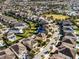 Aerial view showing home's location in a community with pools and lush landscaping at 7639 Wilmington Loop, Kissimmee, FL 34747