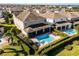 An aerial view showcasing the home's private pool and backyard oasis at 7639 Wilmington Loop, Kissimmee, FL 34747