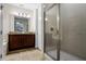 Bathroom features a large shower and granite vanity at 7639 Wilmington Loop, Kissimmee, FL 34747