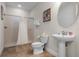 Full bathroom with shower/tub combo and updated fixtures at 7639 Wilmington Loop, Kissimmee, FL 34747