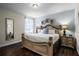 Spacious bedroom with king-size bed and elegant furnishings at 7639 Wilmington Loop, Kissimmee, FL 34747