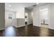 Upstairs hallway with laundry closet and bedroom access at 7639 Wilmington Loop, Kissimmee, FL 34747