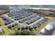 Aerial view of a residential neighborhood near a lake at 12749 Brodlove Lane, Winter Garden, FL 34787