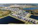 Aerial view of a community with many houses and lakes at 12749 Brodlove Lane, Winter Garden, FL 34787