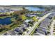 Aerial view of community pool and surrounding houses at 12749 Brodlove Lane, Winter Garden, FL 34787