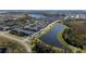 Aerial view of community with lake and conservation area at 12749 Brodlove Lane, Winter Garden, FL 34787