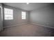 Bright bedroom with neutral walls and carpet at 12749 Brodlove Lane, Winter Garden, FL 34787