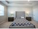 Bright bedroom with a comfortable bed and neutral decor at 12749 Brodlove Lane, Winter Garden, FL 34787