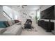 Spacious living area with comfortable seating, large TV, and modern decor at 12749 Brodlove Lane, Winter Garden, FL 34787