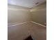 Spacious carpeted bedroom with neutral walls at 2018 Gold Spring Cv, Kissimmee, FL 34743
