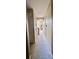 Bright hallway with carpeted floors and access to other rooms at 2018 Gold Spring Cv, Kissimmee, FL 34743
