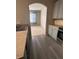 Kitchen with gray cabinets, stainless steel appliances, and double sink at 2018 Gold Spring Cv, Kissimmee, FL 34743