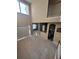 Two-story living room with high ceilings and view of kitchen at 2018 Gold Spring Cv, Kissimmee, FL 34743