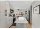 Modern kitchen with white cabinets, quartz countertops and stainless steel appliances at 2254 Ohara Ct # 1055, Orlando, FL 32812