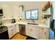 Updated kitchen, white cabinets, stainless steel appliances, quartz countertops at 2254 Ohara Ct # 1055, Orlando, FL 32812