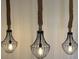 Three unique pendant lights with rope accents and wire shades at 2254 Ohara Ct # 1055, Orlando, FL 32812