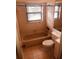 Clean bathroom with a bathtub, toilet and single vanity at 3036 S Semoran Blvd # S, Orlando, FL 32822