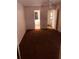 Condo bedroom with carpeted floors and access to bathroom at 3036 S Semoran Blvd # S, Orlando, FL 32822