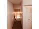 Hallway with carpeted floor leading to upper level at 3036 S Semoran Blvd # S, Orlando, FL 32822