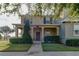 Inviting front porch with manicured landscaping and a charming walkway at 3125 Aqua Virgo Loop # 56, Orlando, FL 32837