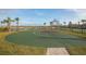 Outdoor basketball court with scenic lake views at 3150 Paradox Cir # 208, Kissimmee, FL 34746