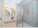 Modern bathroom with a large walk-in shower and double vanity at 3150 Paradox Cir # 208, Kissimmee, FL 34746