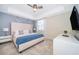 Spacious Primary bedroom with king-size bed and plenty of natural light at 3150 Paradox Cir # 208, Kissimmee, FL 34746