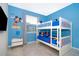 Mickey Mouse themed bedroom with a bunk bed at 3150 Paradox Cir # 208, Kissimmee, FL 34746