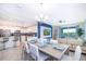 Open concept kitchen and dining area with modern appliances and seating at 3150 Paradox Cir # 208, Kissimmee, FL 34746