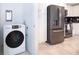 Convenient laundry room with a washer and dryer at 3150 Paradox Cir # 208, Kissimmee, FL 34746