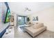 Spacious living room with a large sectional sofa and a flat-screen TV at 3150 Paradox Cir # 208, Kissimmee, FL 34746