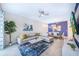 Bright and airy living room featuring a comfortable sectional sofa and dining area at 3150 Paradox Cir # 208, Kissimmee, FL 34746