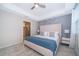Relaxing main bedroom with a king-size bed and en-suite bathroom at 3150 Paradox Cir # 208, Kissimmee, FL 34746