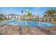 Community spray park with colorful water features and ample seating at 3150 Paradox Cir # 208, Kissimmee, FL 34746
