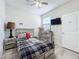 Cozy bedroom featuring a twin-size bed and dresser at 320 Anchovie Ct, Kissimmee, FL 34759