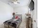bedroom with twin bed, dresser, and fun decor at 320 Anchovie Ct, Kissimmee, FL 34759