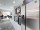 Modern kitchen with stainless steel appliances and granite countertops at 320 Anchovie Ct, Kissimmee, FL 34759