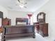 Spacious main bedroom with a king-size bed and ample closet space at 320 Anchovie Ct, Kissimmee, FL 34759