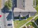 Aerial view showing home's roofline and parking at 4012 Santa Maria # 101, Kissimmee, FL 34741