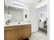 Clean bathroom with a double vanity and updated fixtures at 4012 Santa Maria # 101, Kissimmee, FL 34741