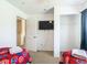 Bedroom with two twin beds, Avengers bedding, and a TV at 4012 Santa Maria # 101, Kissimmee, FL 34741