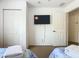 Bedroom with two twin beds, Frozen bedding, and a TV at 4012 Santa Maria # 101, Kissimmee, FL 34741