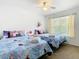 Bedroom with two twin beds, Frozen bedding, and Frozen decor at 4012 Santa Maria # 101, Kissimmee, FL 34741