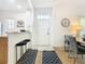 Entryway with kitchen and dining area views and access to living room at 4012 Santa Maria # 101, Kissimmee, FL 34741