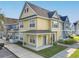 Two-story townhome with covered entry and landscaping at 4012 Santa Maria # 101, Kissimmee, FL 34741